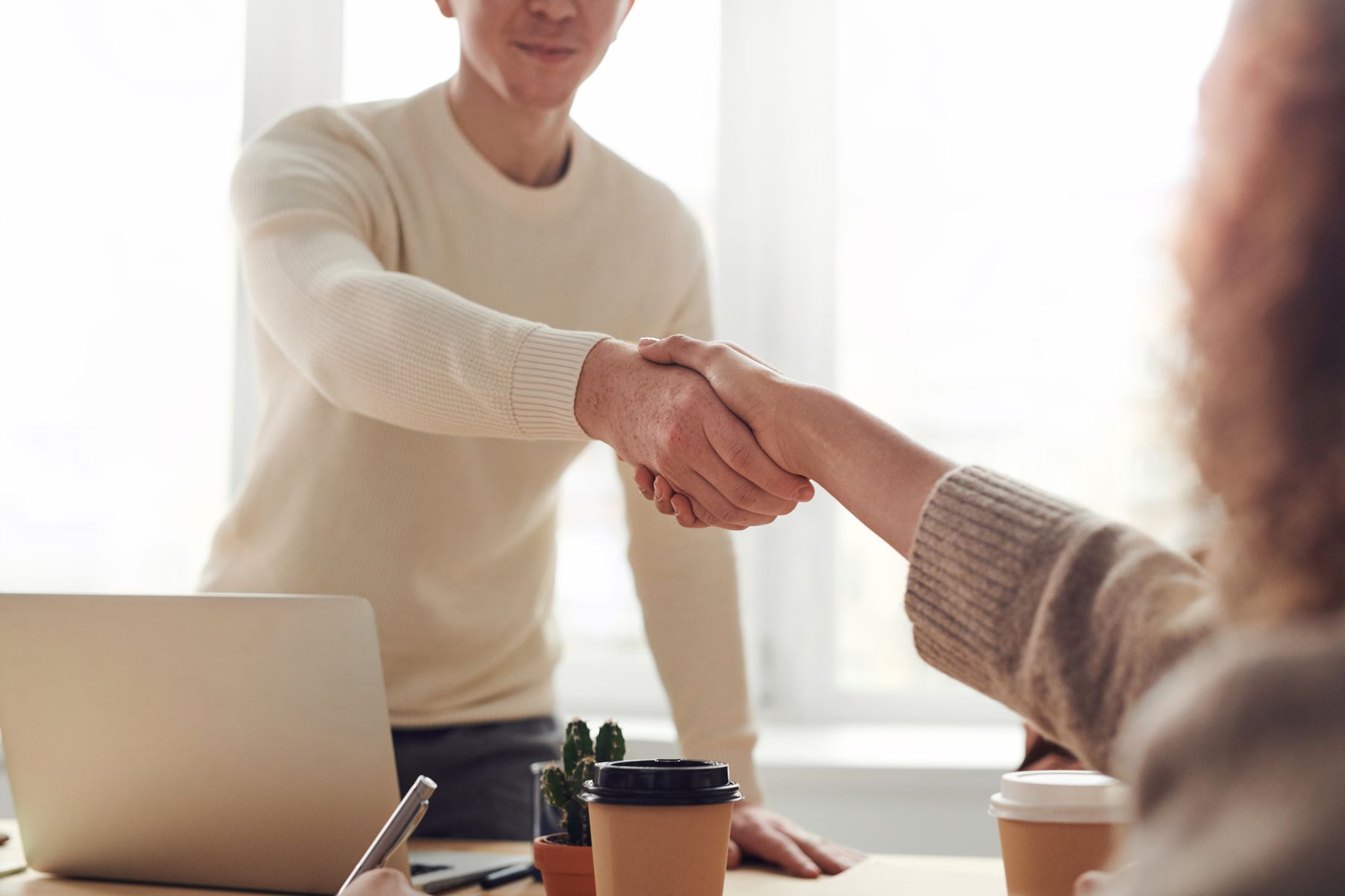 Accountant shaking hands with a client